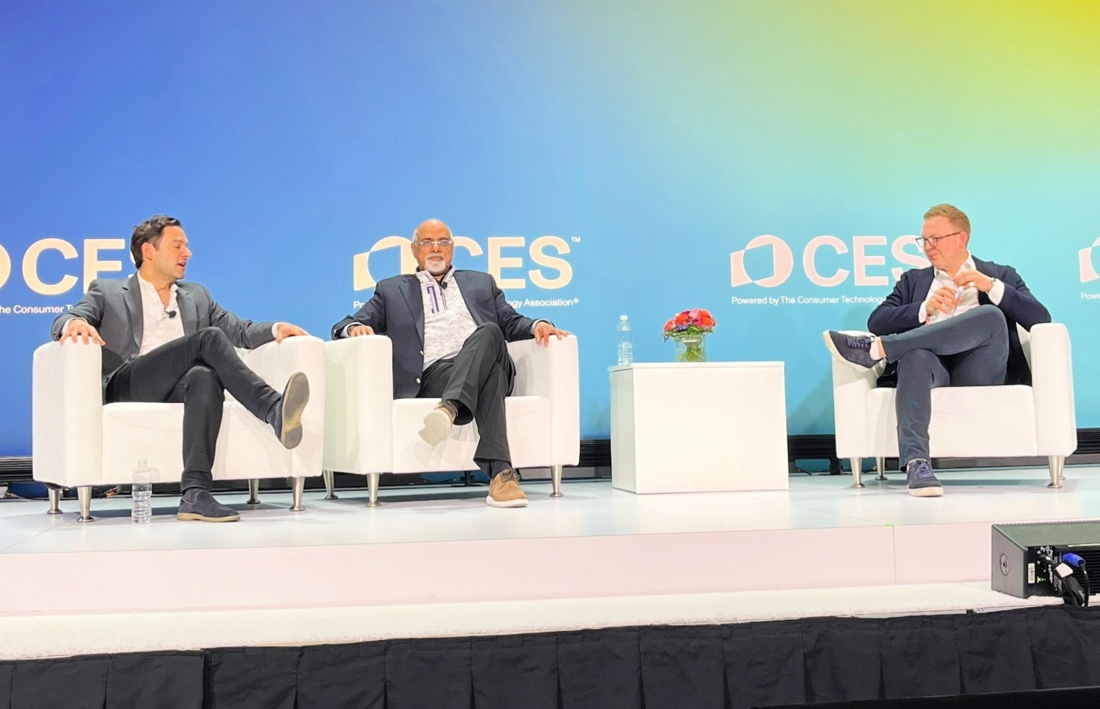 Josh Simon from Netflix, Raja Rajammannar from Mastercard, and Ben Jeffries from Influencer on the CES stage. 