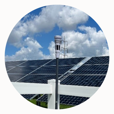 A weather station next to solar panels at Mastercard's St. Louis offices.